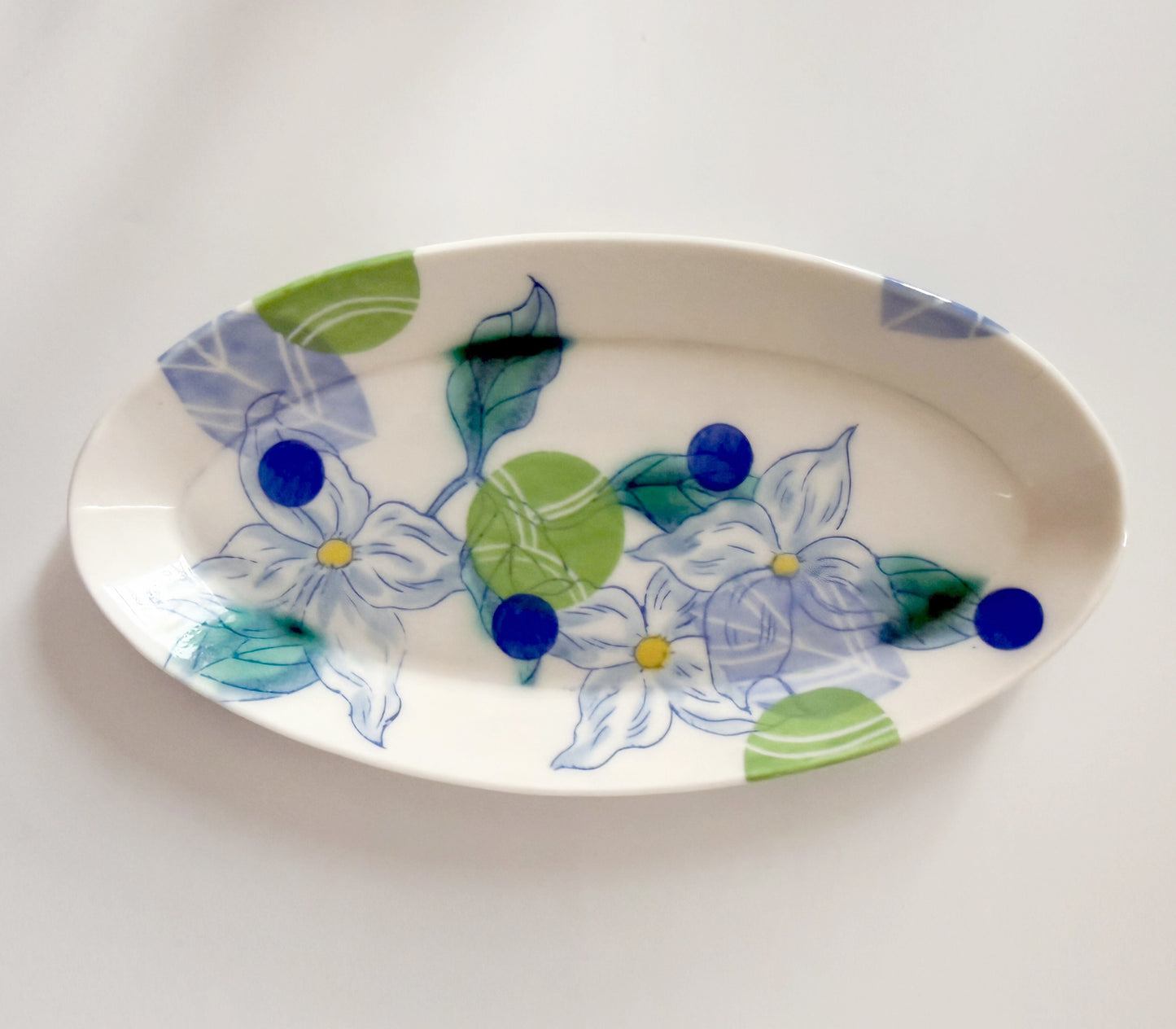 Oval plate with dogwood blossoms