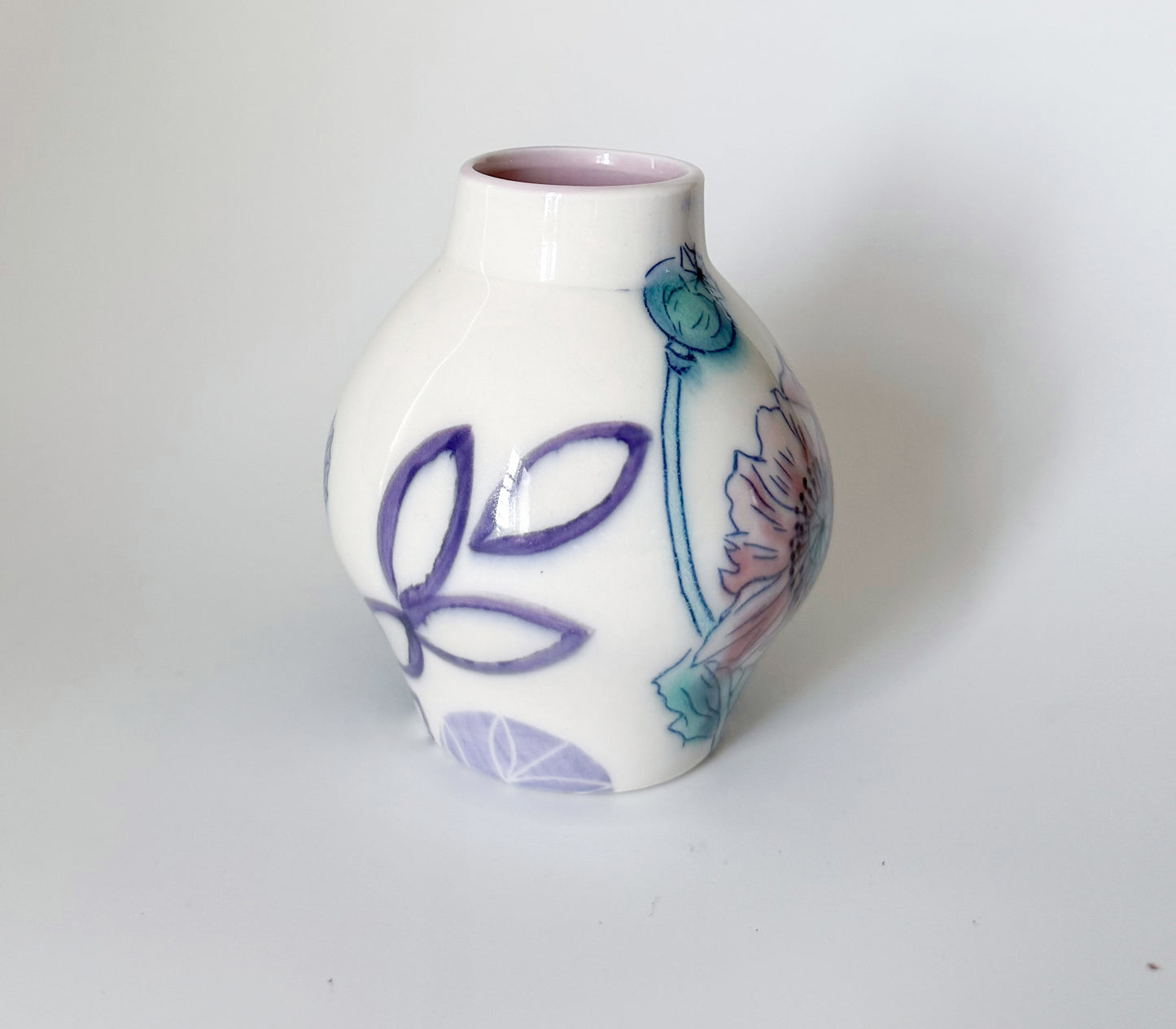 Bud vase with pink poppies