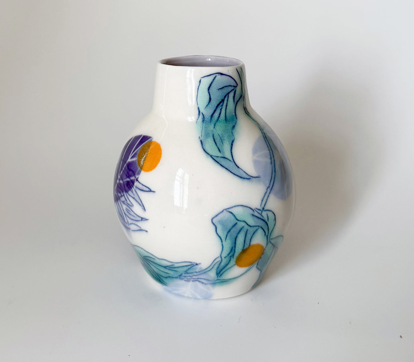 Bud vase with clematis