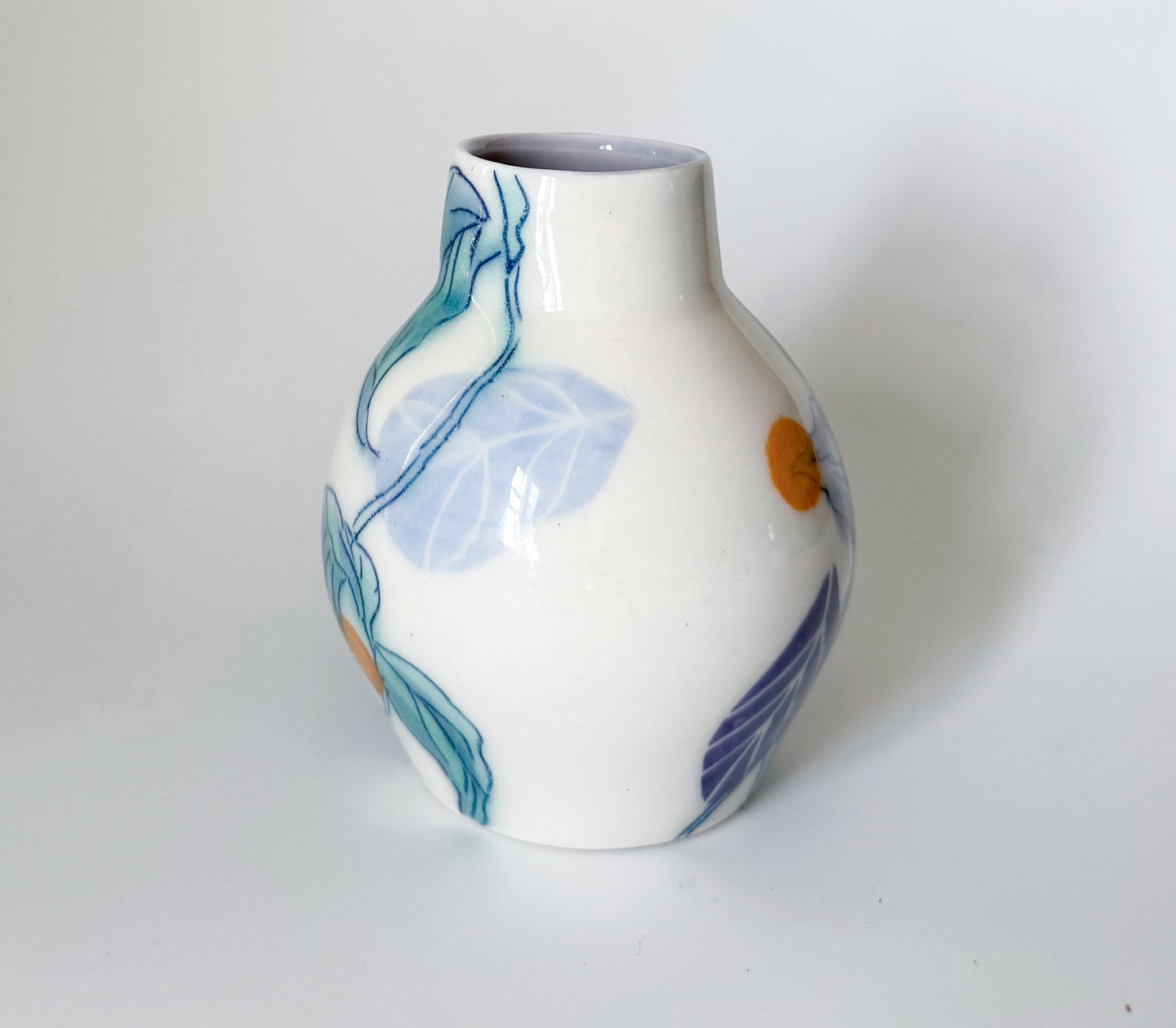 Bud vase with clematis