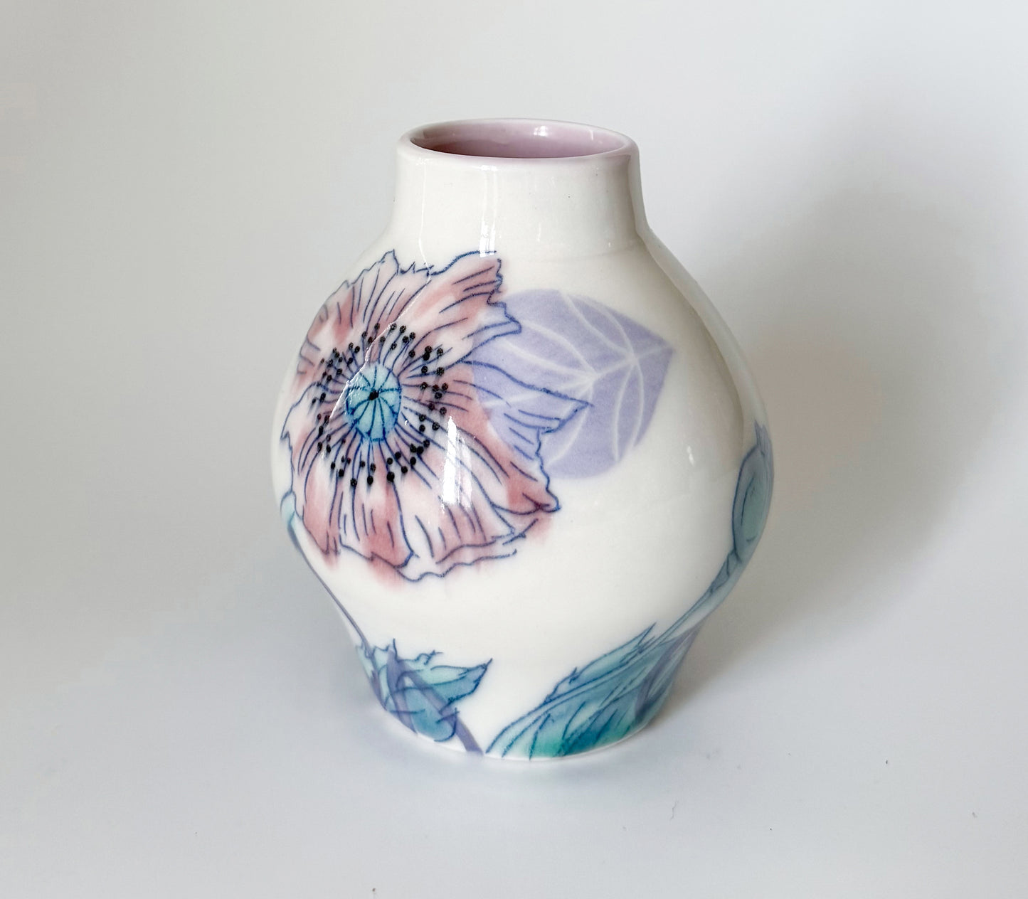 Bud vase with pink poppies