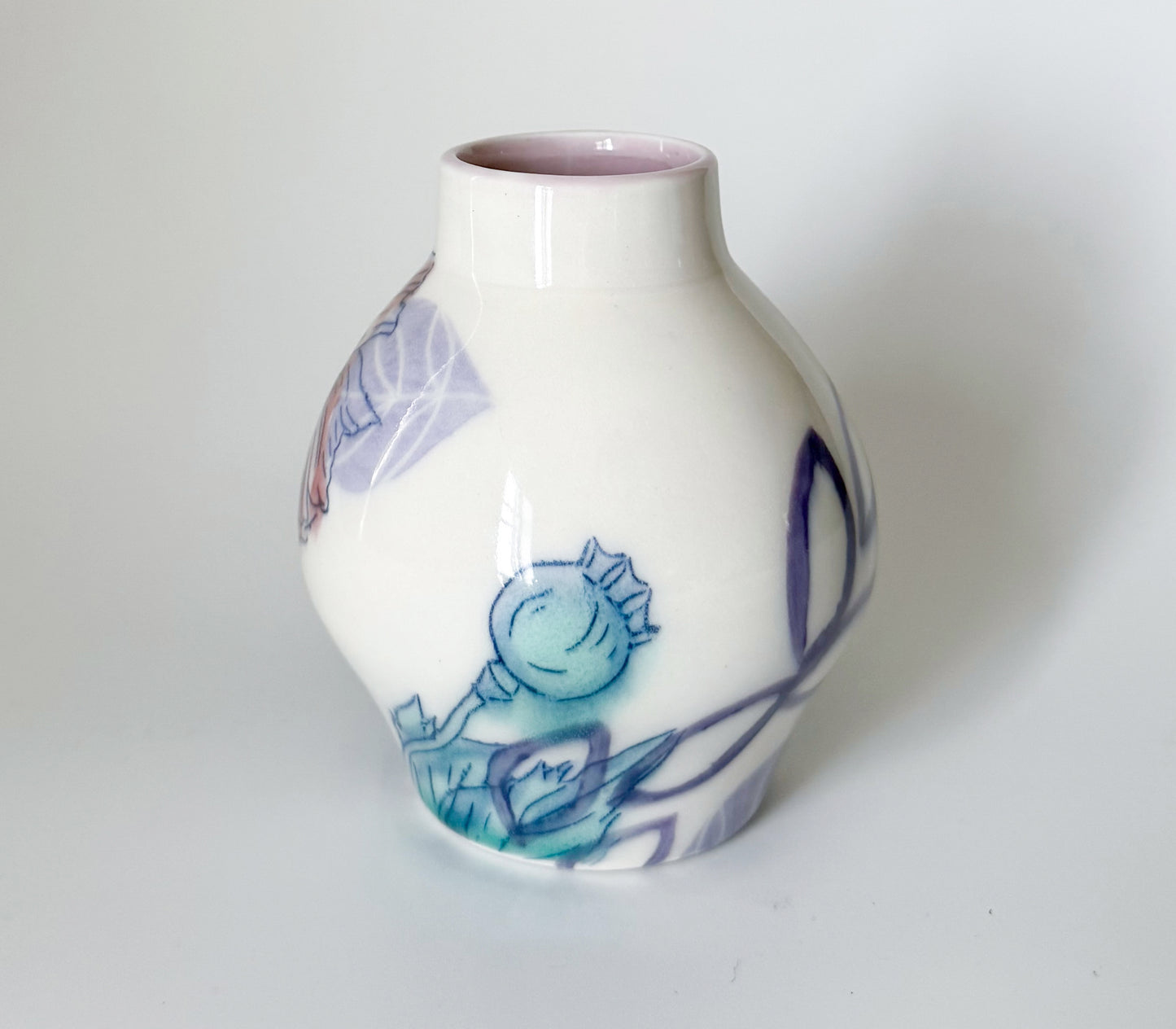 Bud vase with pink poppies