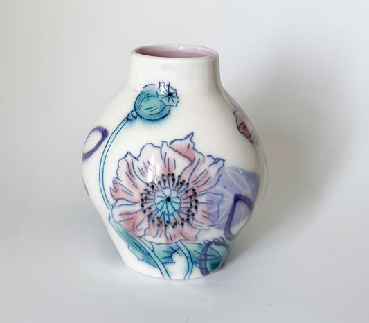 Bud vase with pink poppies