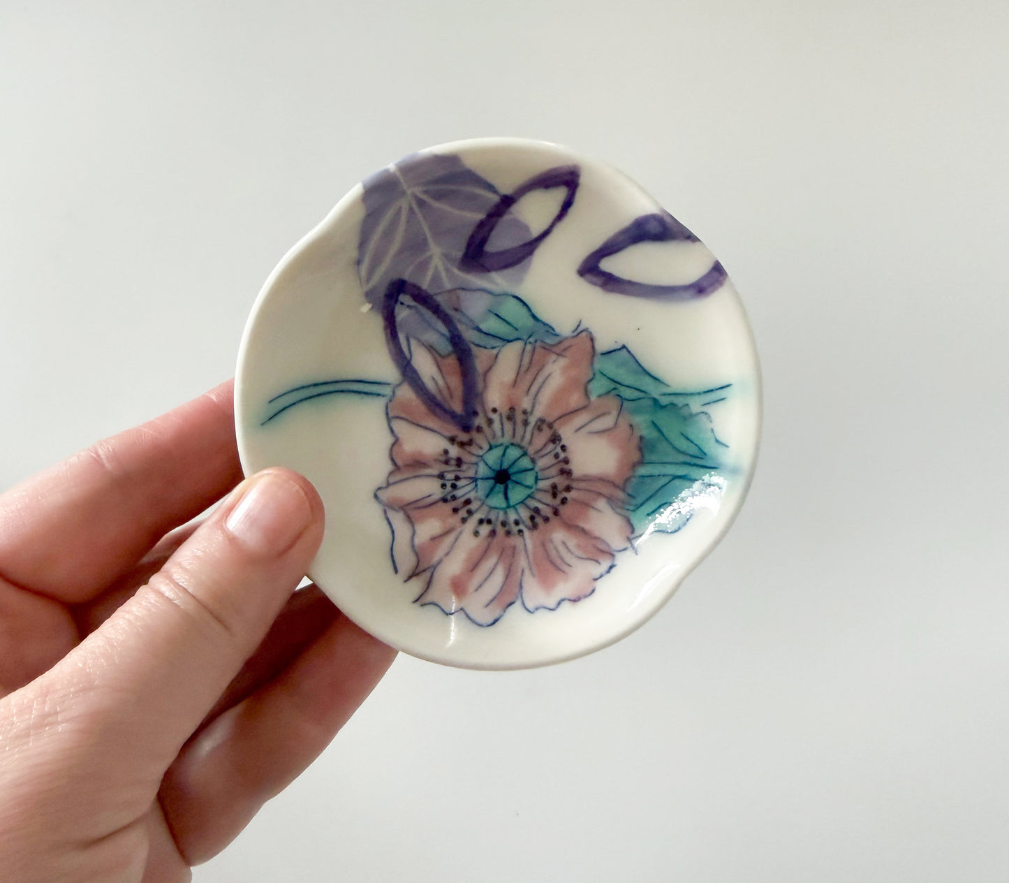 Small dish with pink poppy