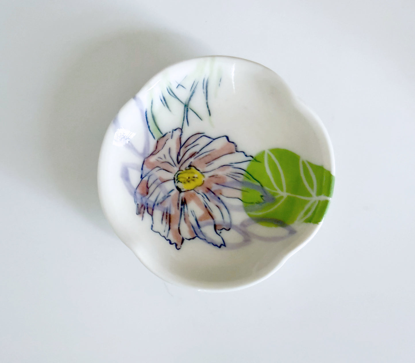 Small dish with cosmos flowers