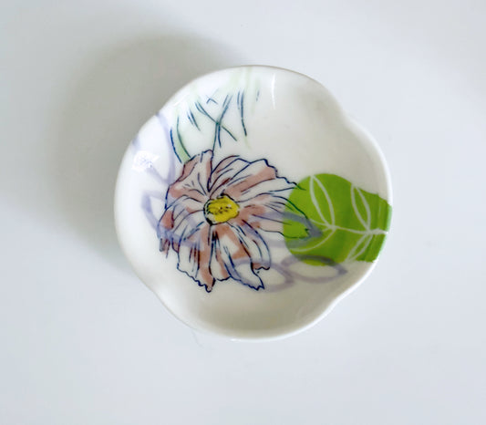 Small dish with cosmos flowers