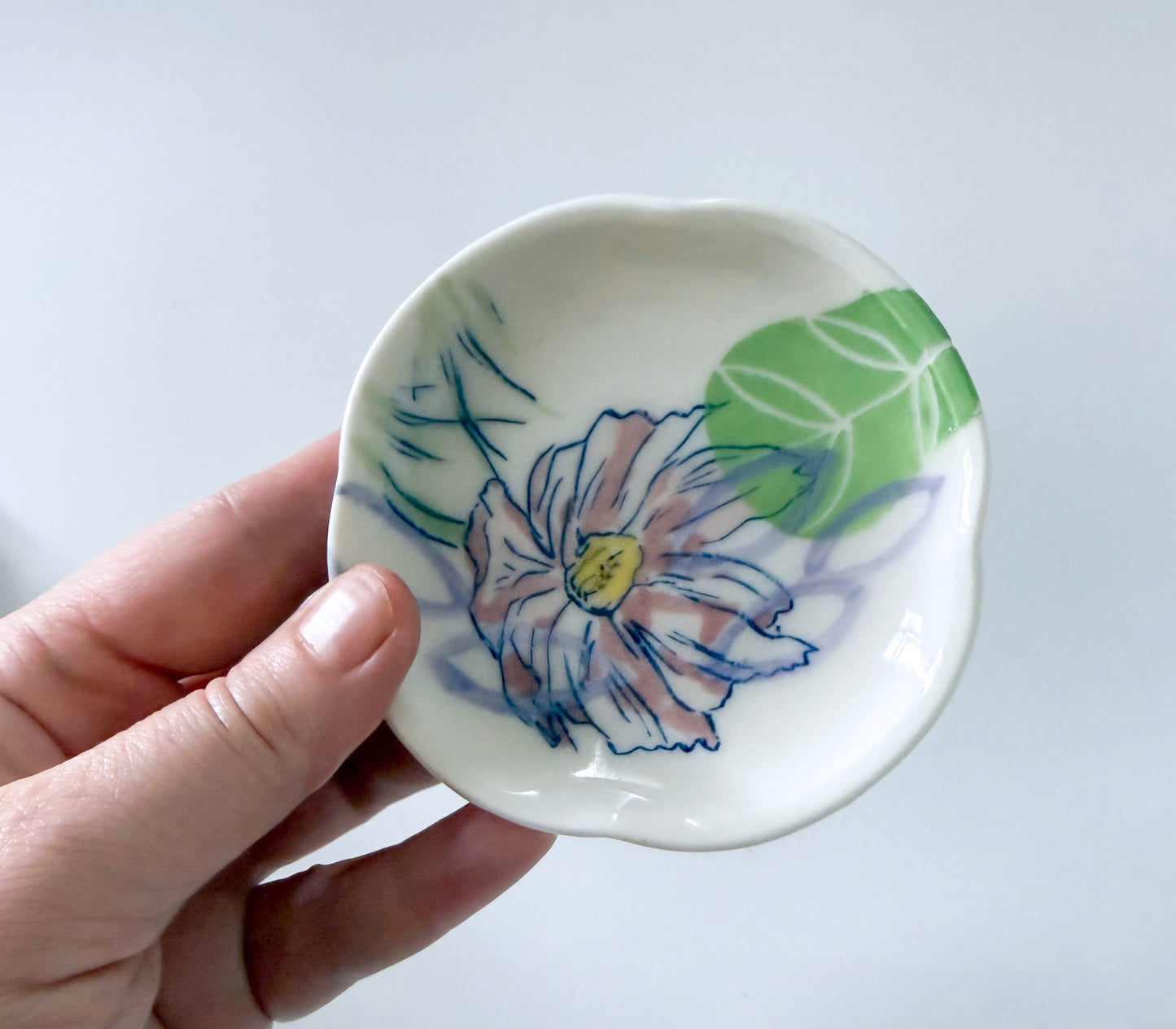 Small dish with cosmos flowers