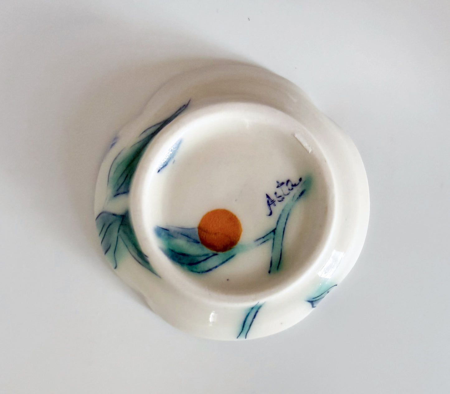 Small dish with clematis