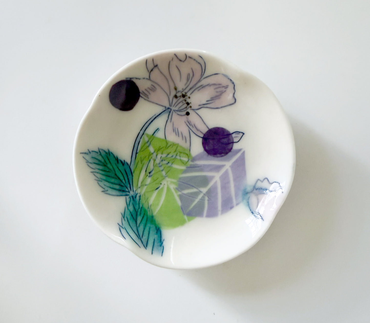 Small dish with rose