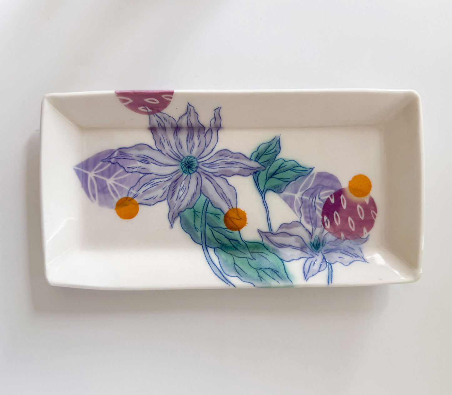 Rectangular plate with clematis