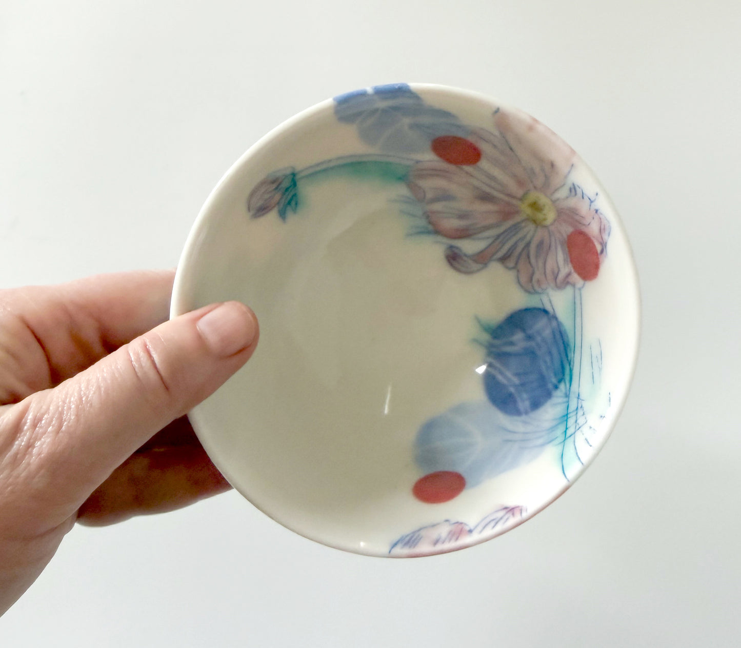 Small bowl with cosmos flowers