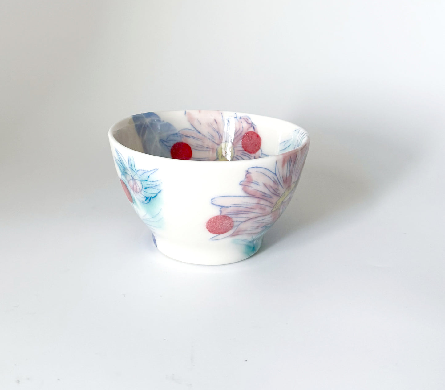 Small bowl with cosmos flowers
