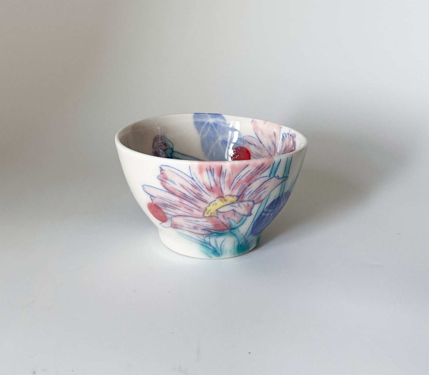 Small bowl with cosmos flowers