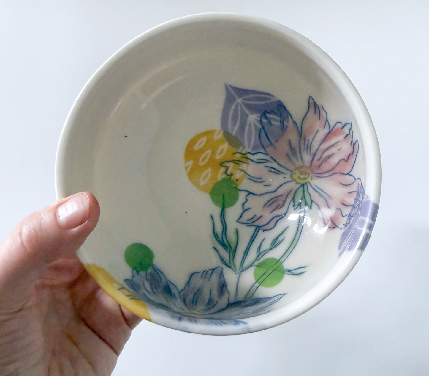 Individual bowl with cosmos flowers
