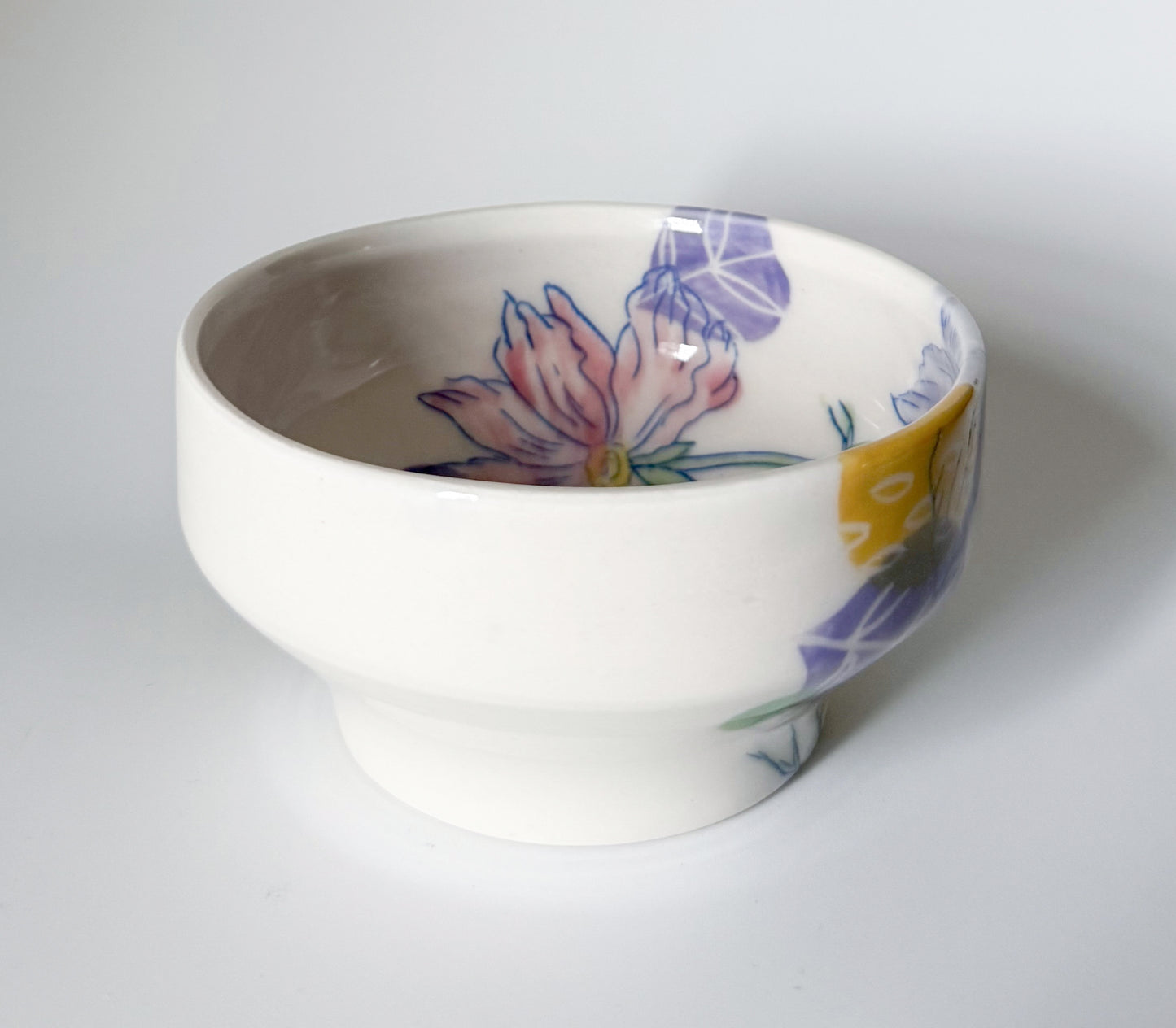 Individual bowl with cosmos flowers