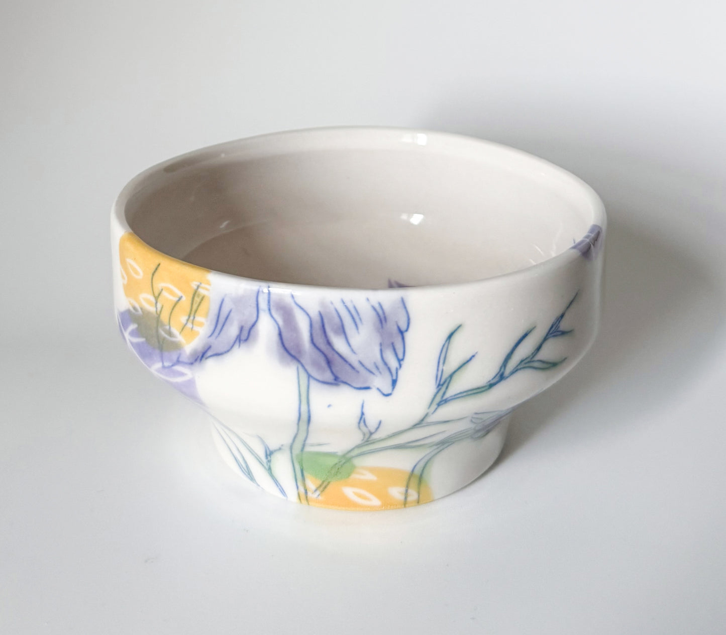 Individual bowl with cosmos flowers