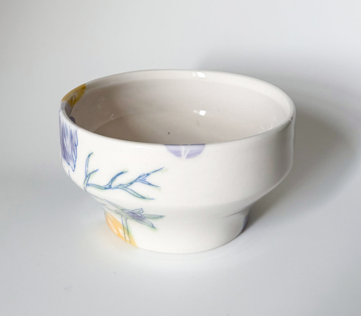 Individual bowl with cosmos flowers