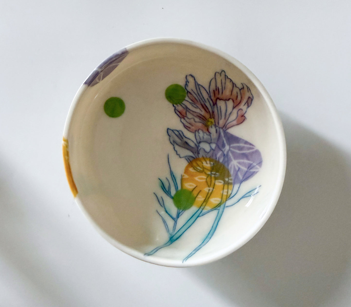 Individual bowl with cosmos flowers