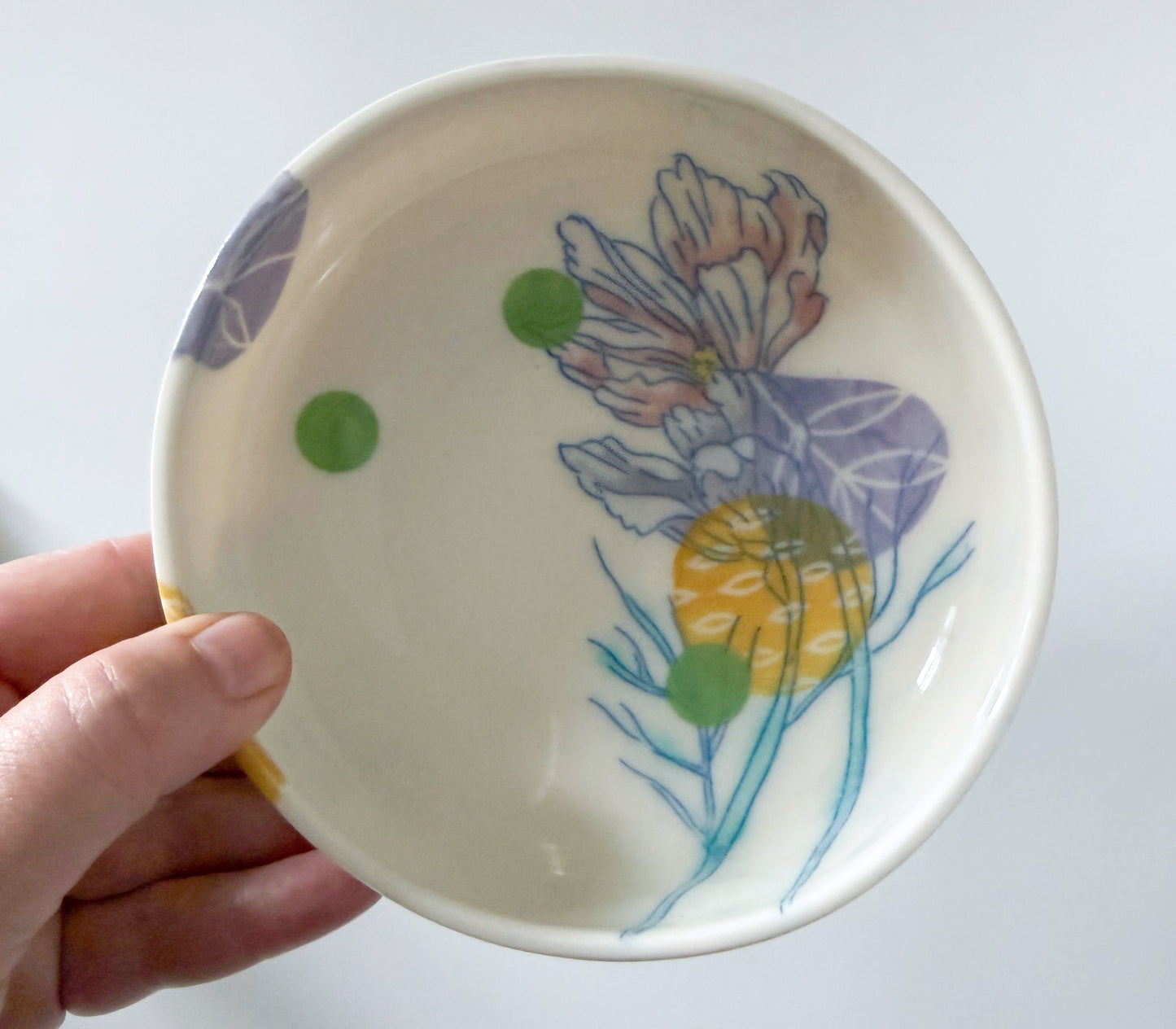 Individual bowl with cosmos flowers