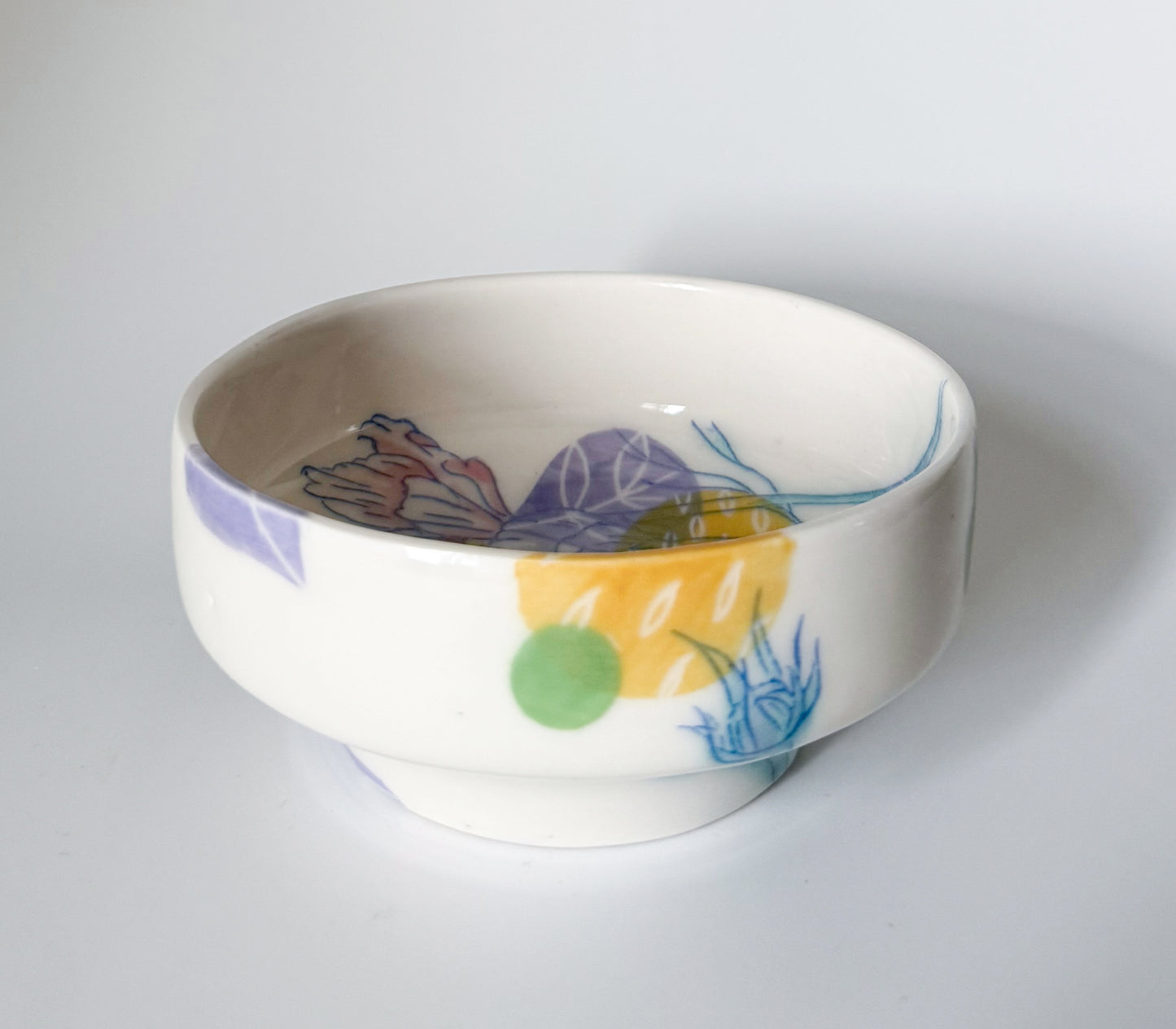 Individual bowl with cosmos flowers