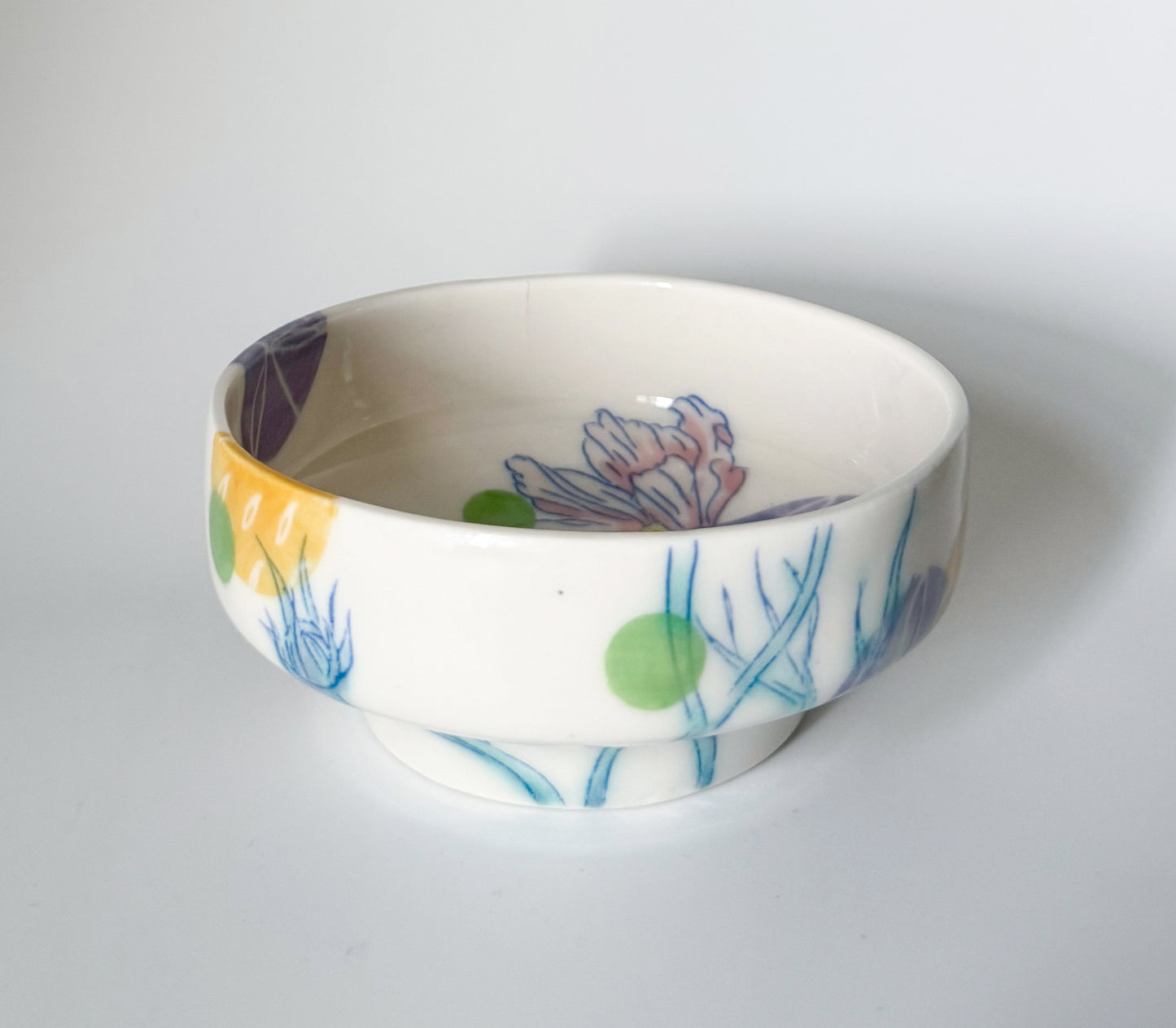Individual bowl with cosmos flowers