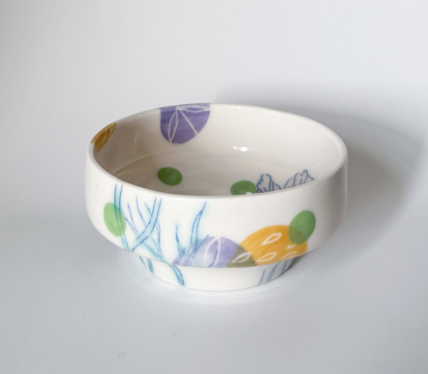 Individual bowl with cosmos flowers
