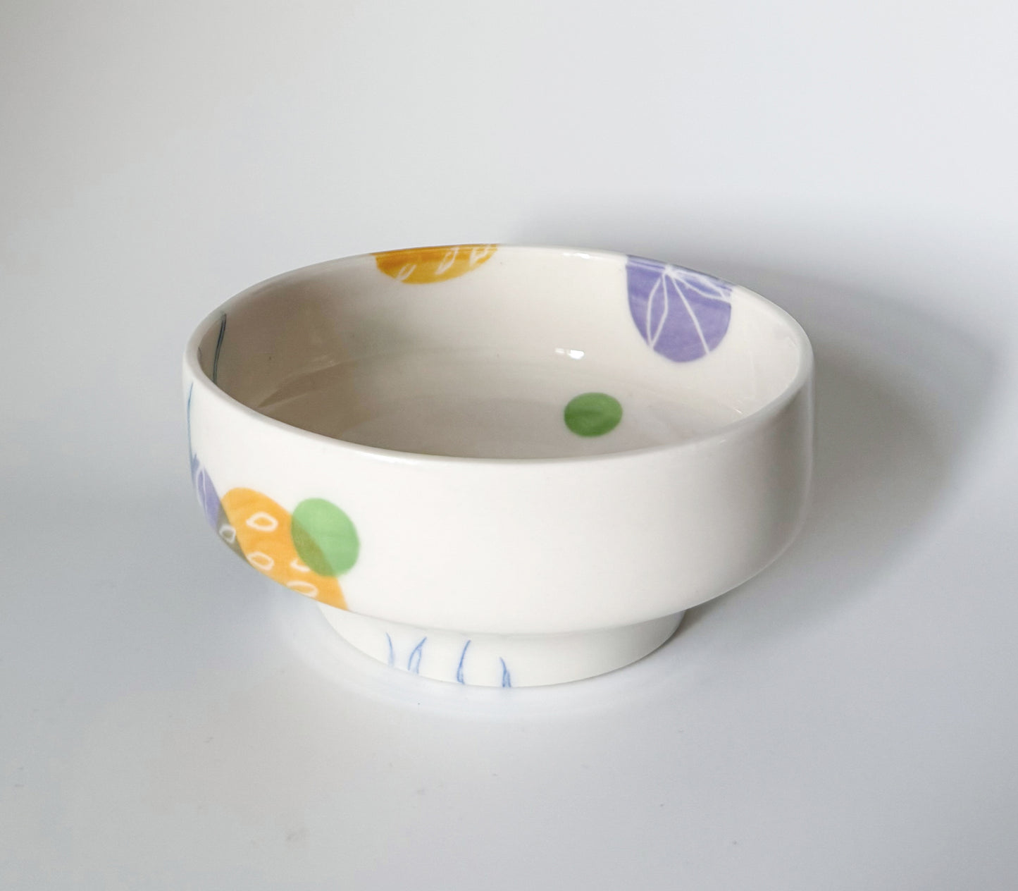 Individual bowl with cosmos flowers