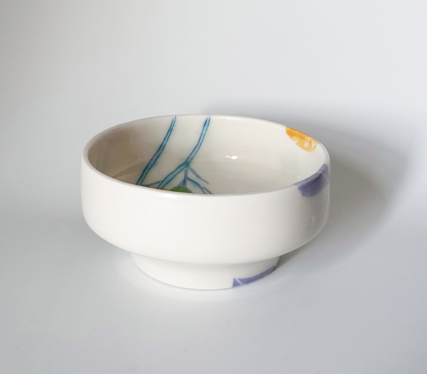 Individual bowl with cosmos flowers