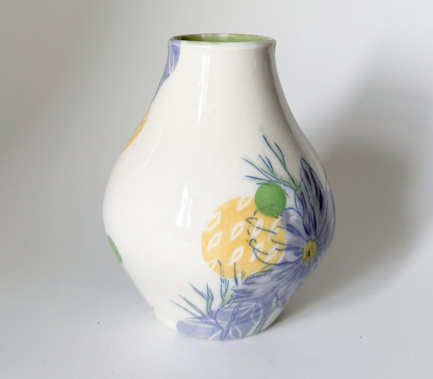 Bud vase with pink cosmos flowers