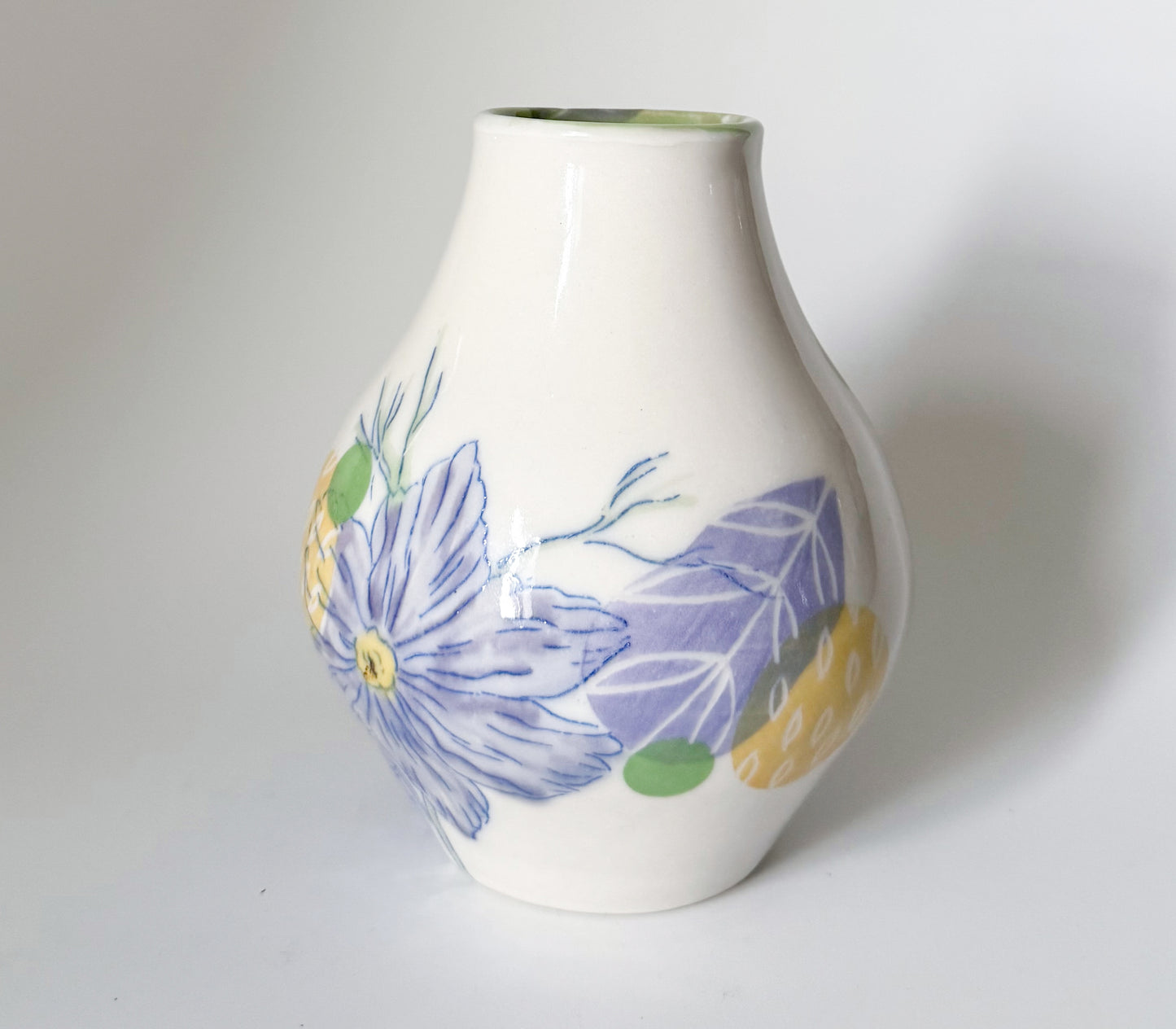Bud vase with pink cosmos flowers