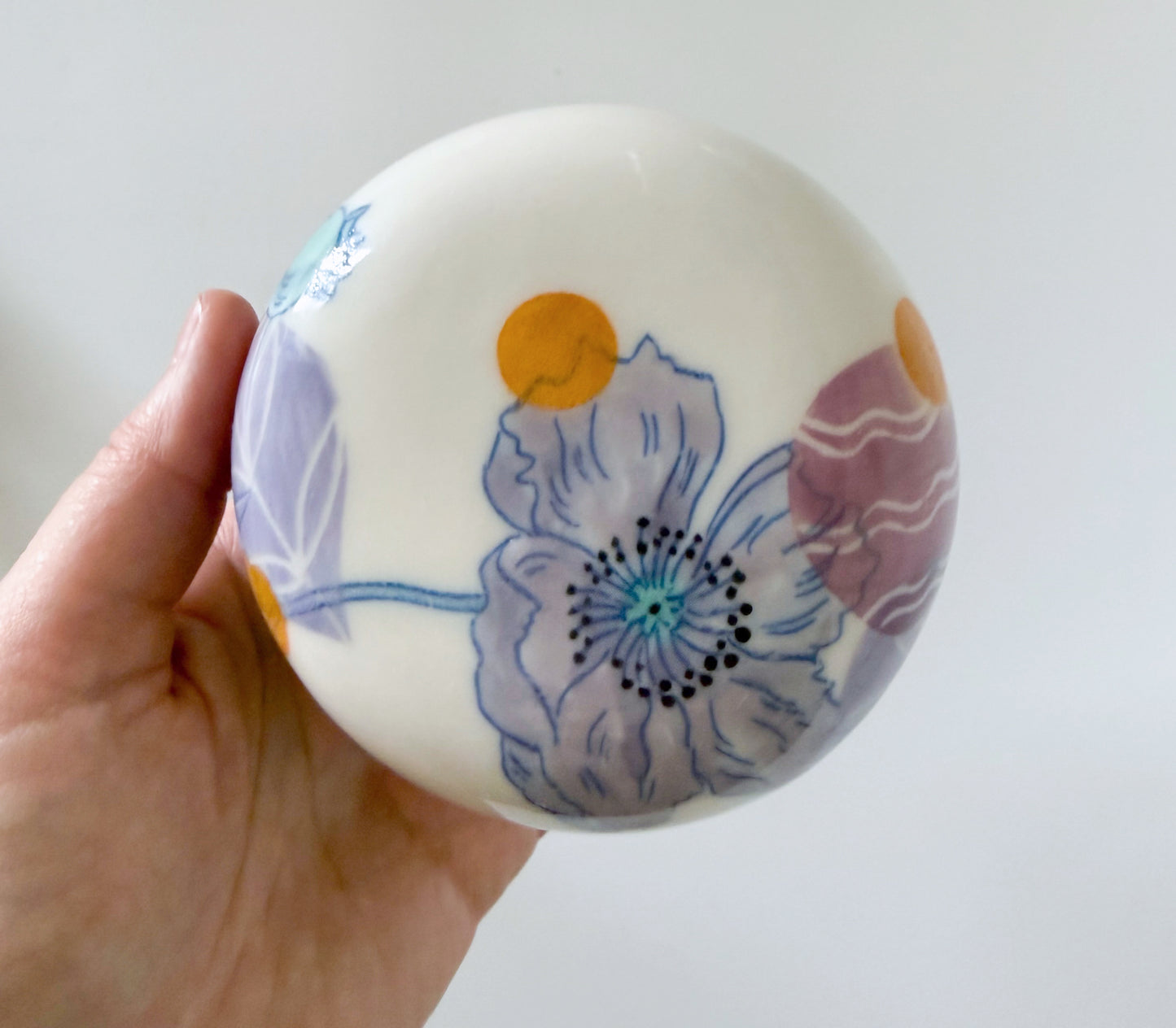 Lidded jar with poppies
