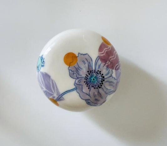 Lidded jar with poppies