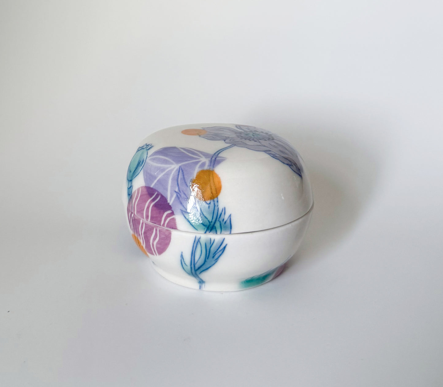 Lidded jar with poppies