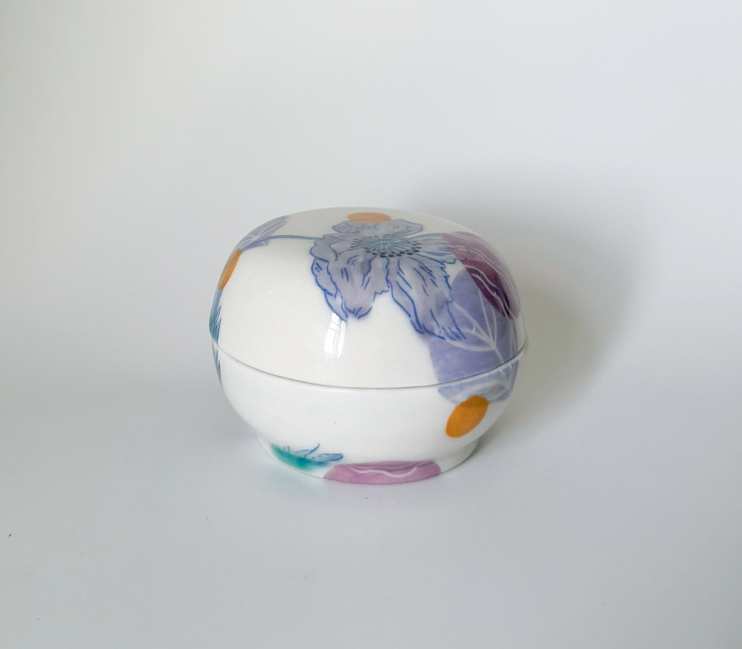 Lidded jar with poppies