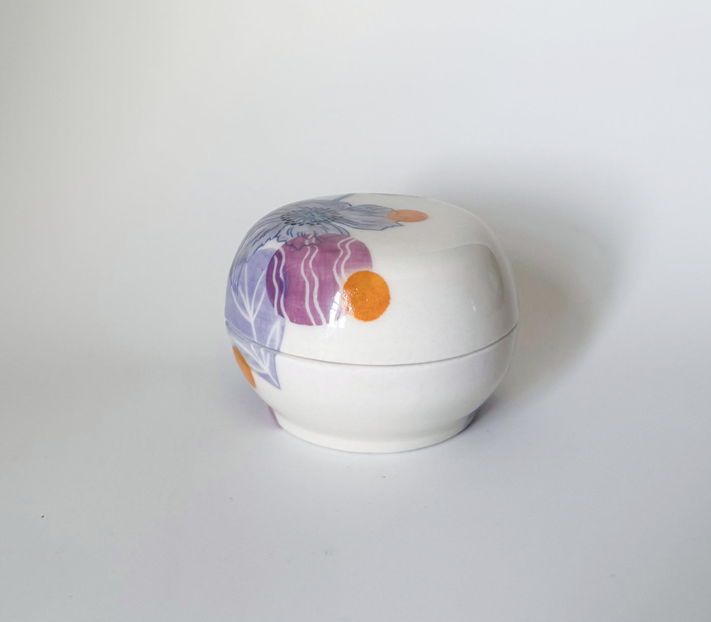Lidded jar with poppies
