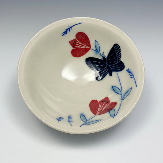 Shallow personal bowl with black butterfly
